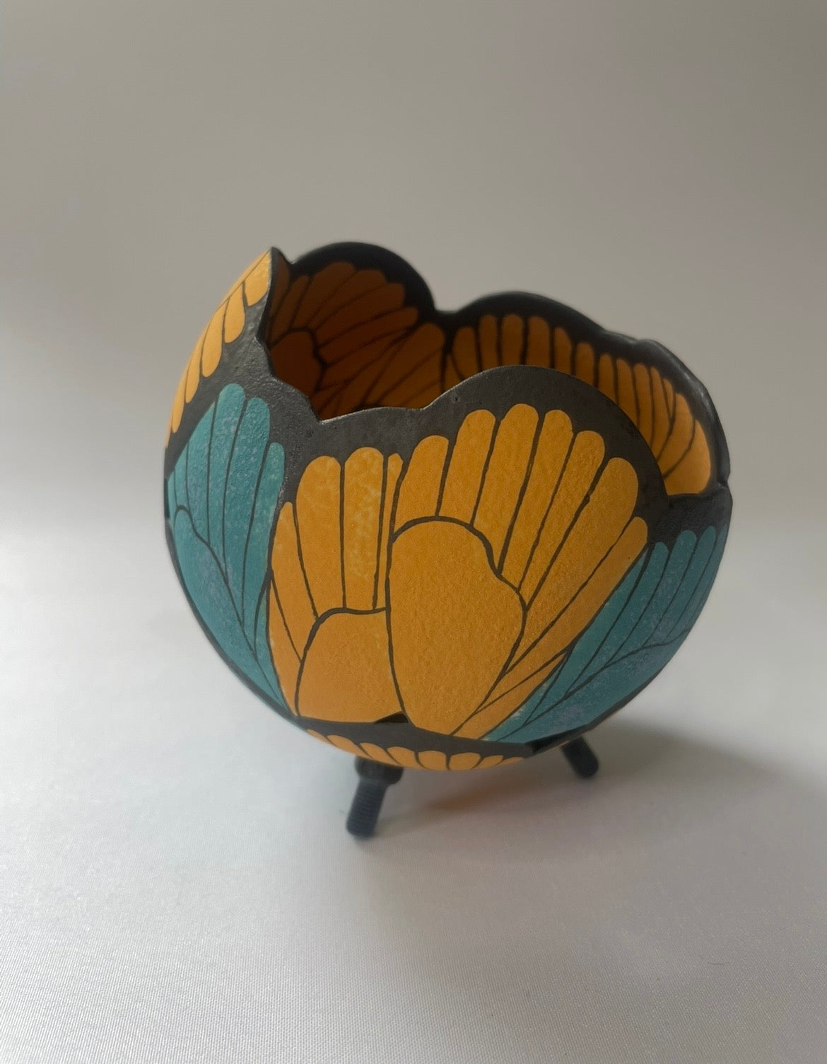 Ceramic butterfly sculpture multi coloured.