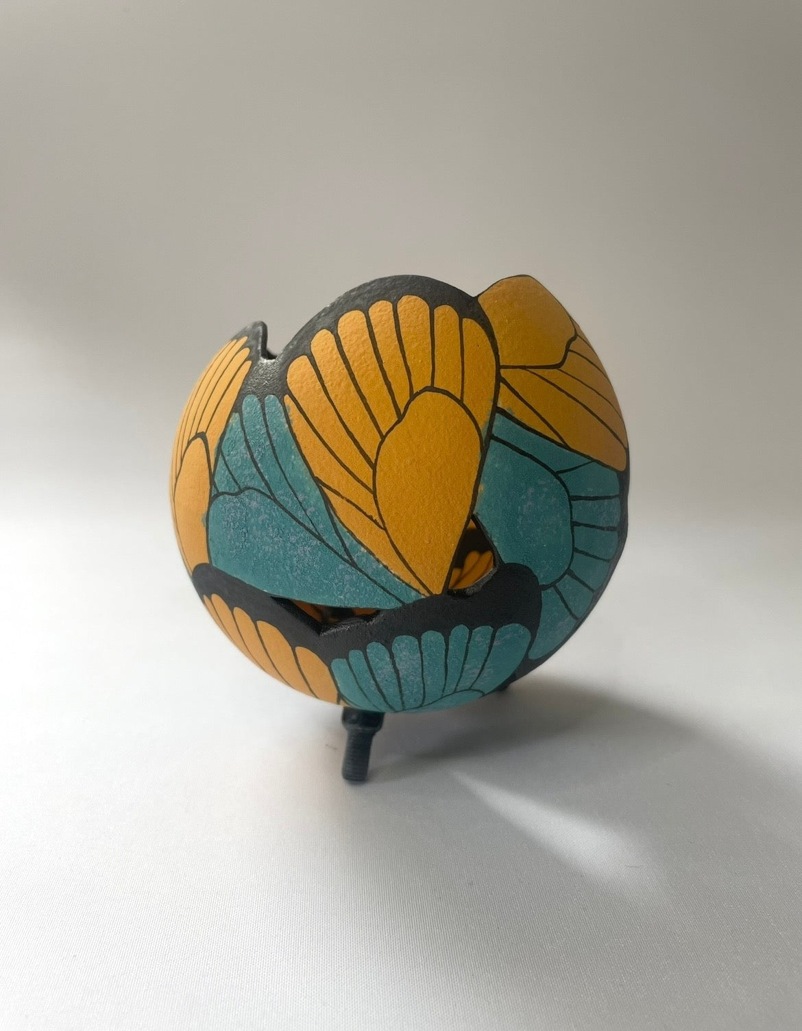 Ceramic butterfly sculpture multi coloured.