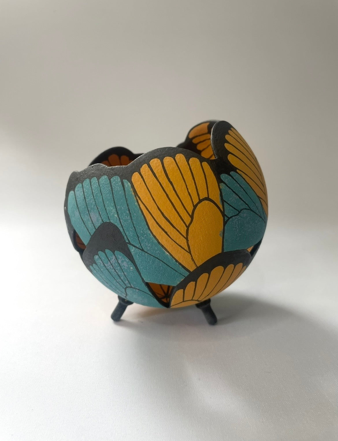 Ceramic butterfly sculpture multi coloured.