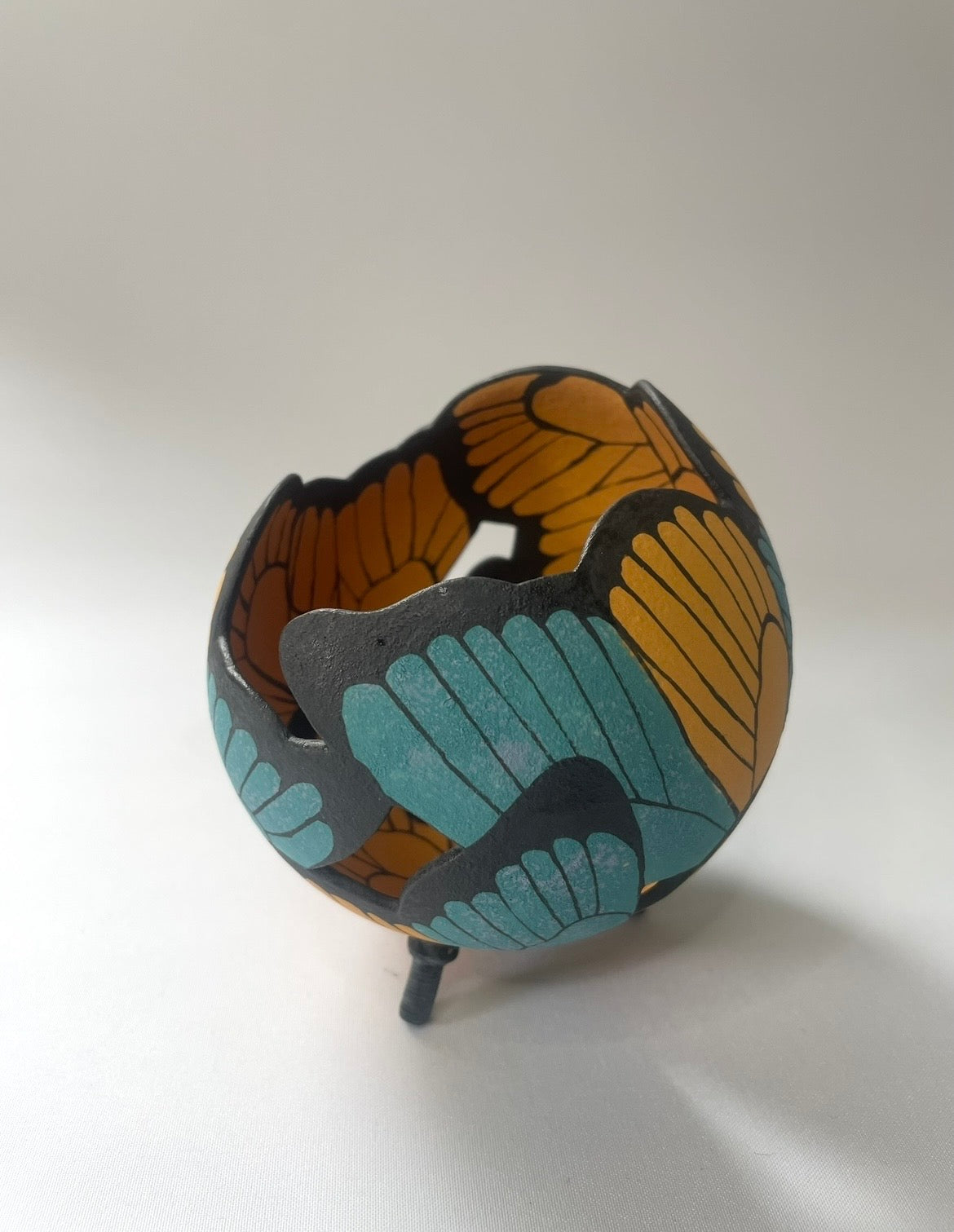 Ceramic butterfly sculpture multi coloured.