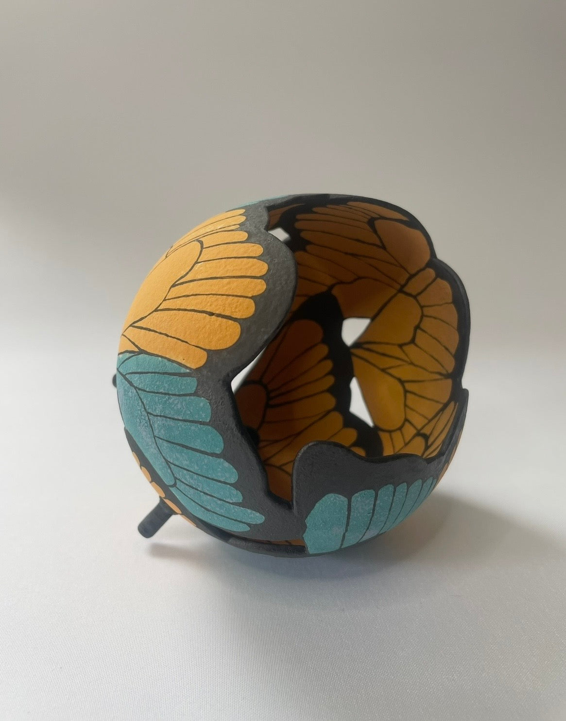 Ceramic butterfly sculpture multi coloured.