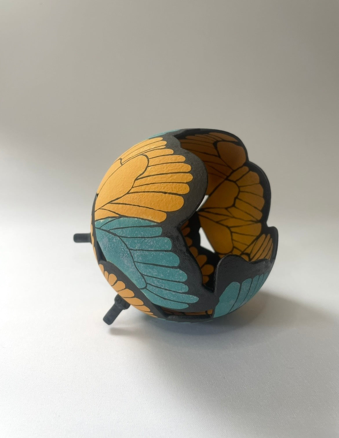 Ceramic butterfly sculpture multi coloured.