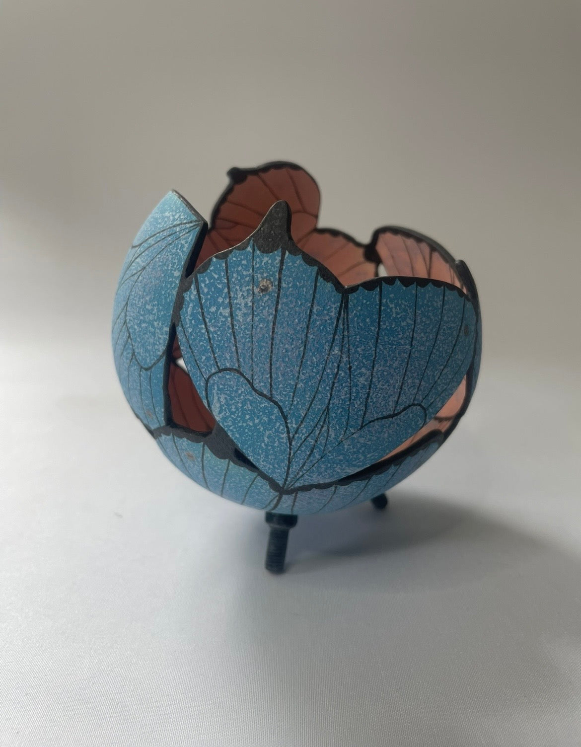 Ceramic butterfly sculpture.