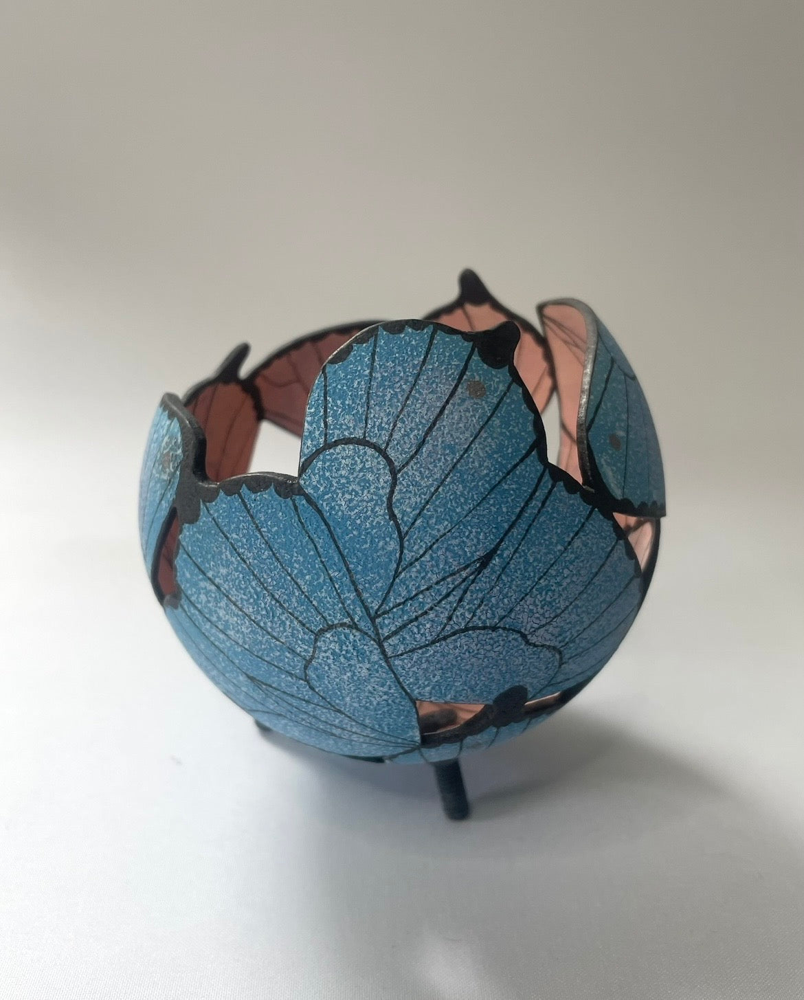 Ceramic butterfly sculpture.
