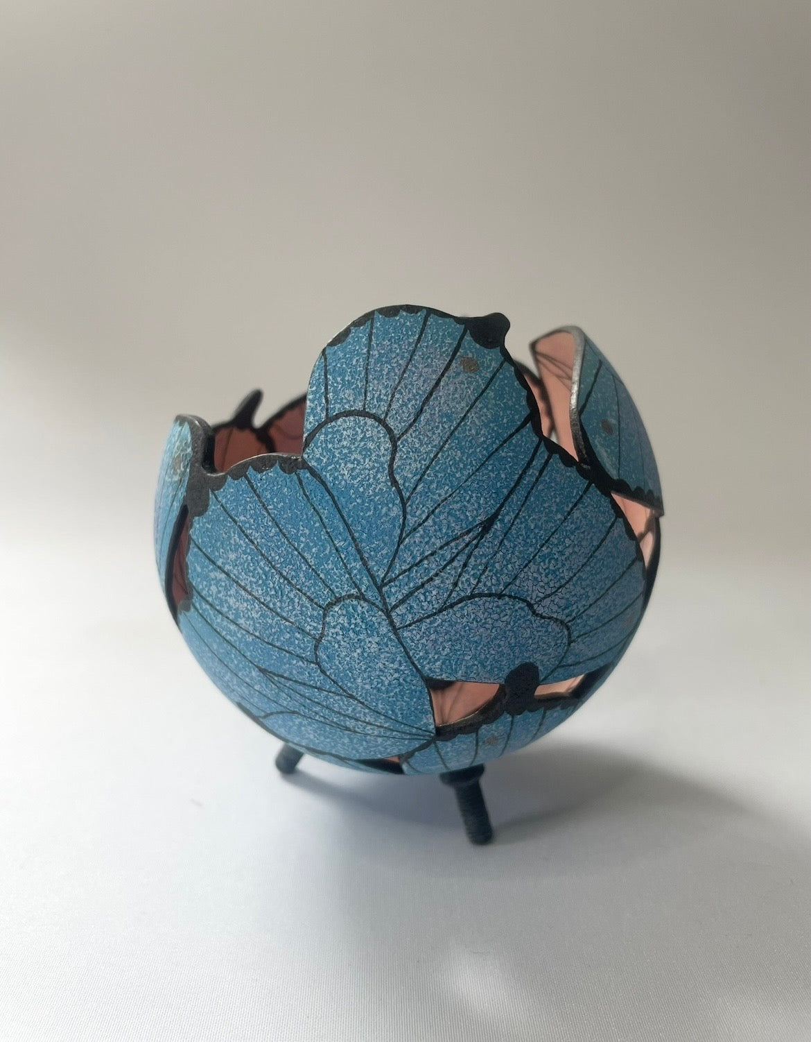 Ceramic butterfly sculpture.