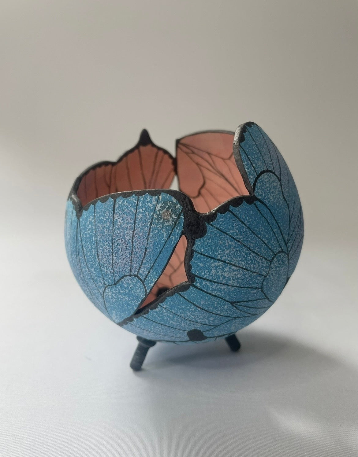 Ceramic butterfly sculpture.