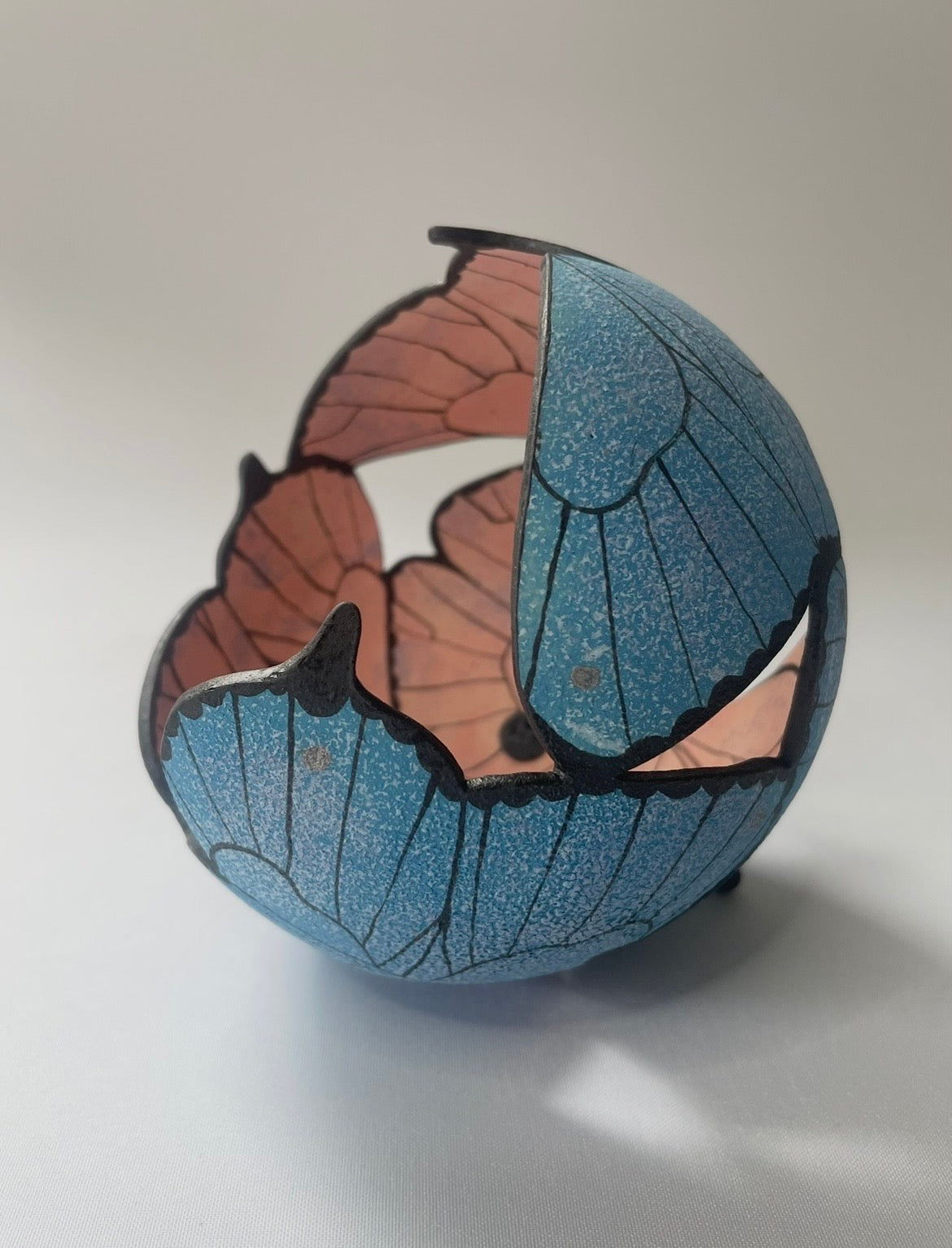 Ceramic butterfly sculpture.