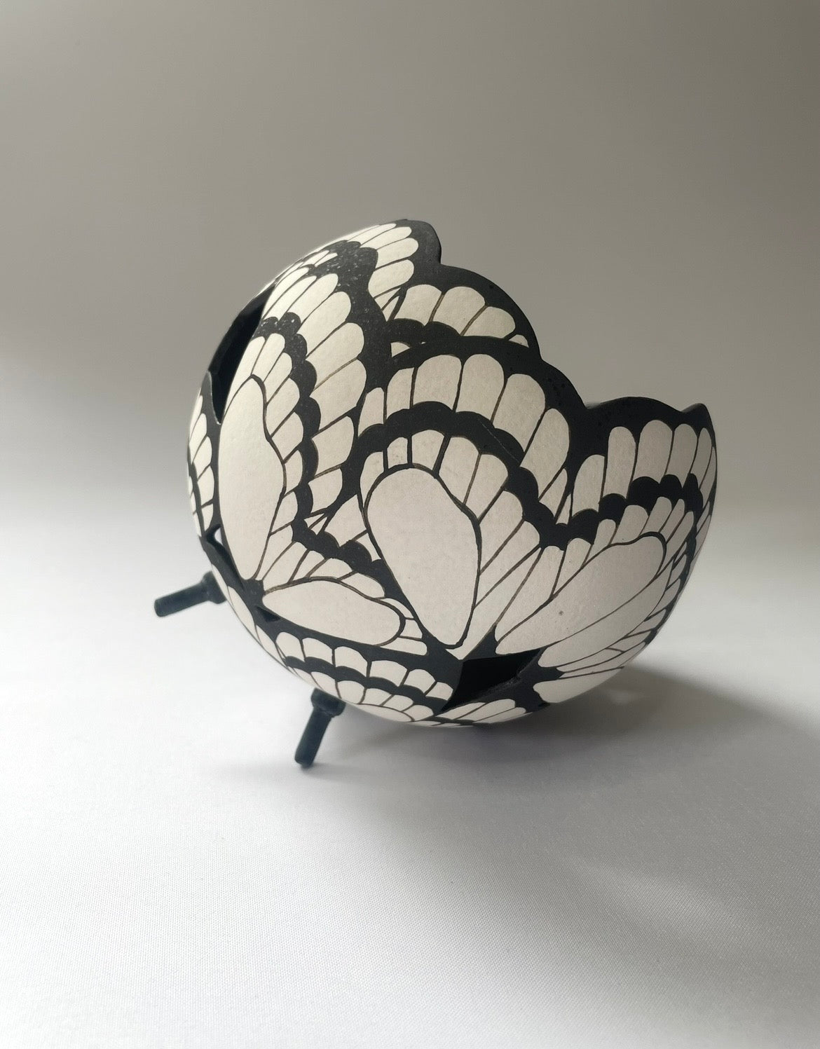 Butterfly ceramic sculpture black and white.