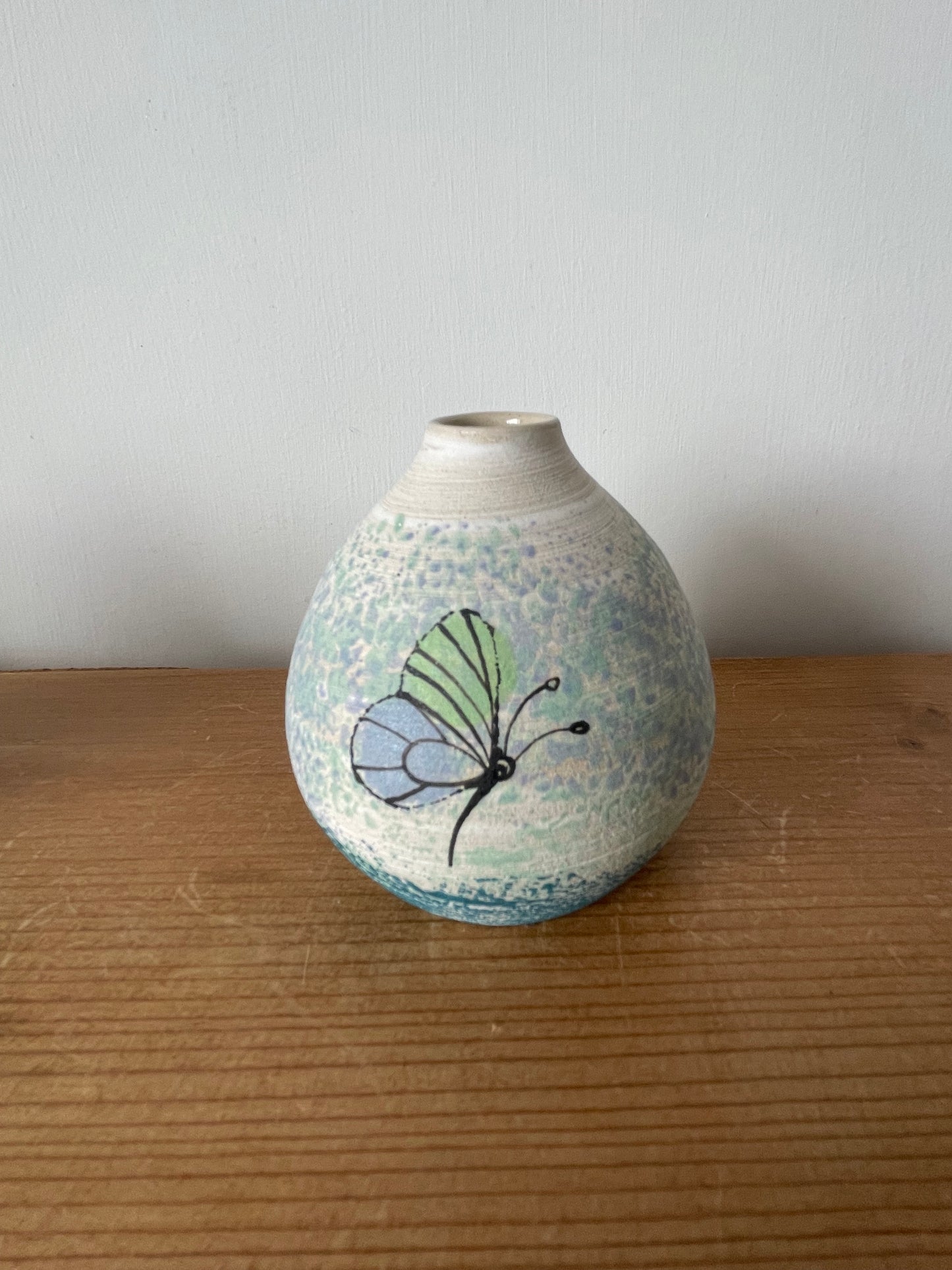 Ceramic butterfly diffuser.