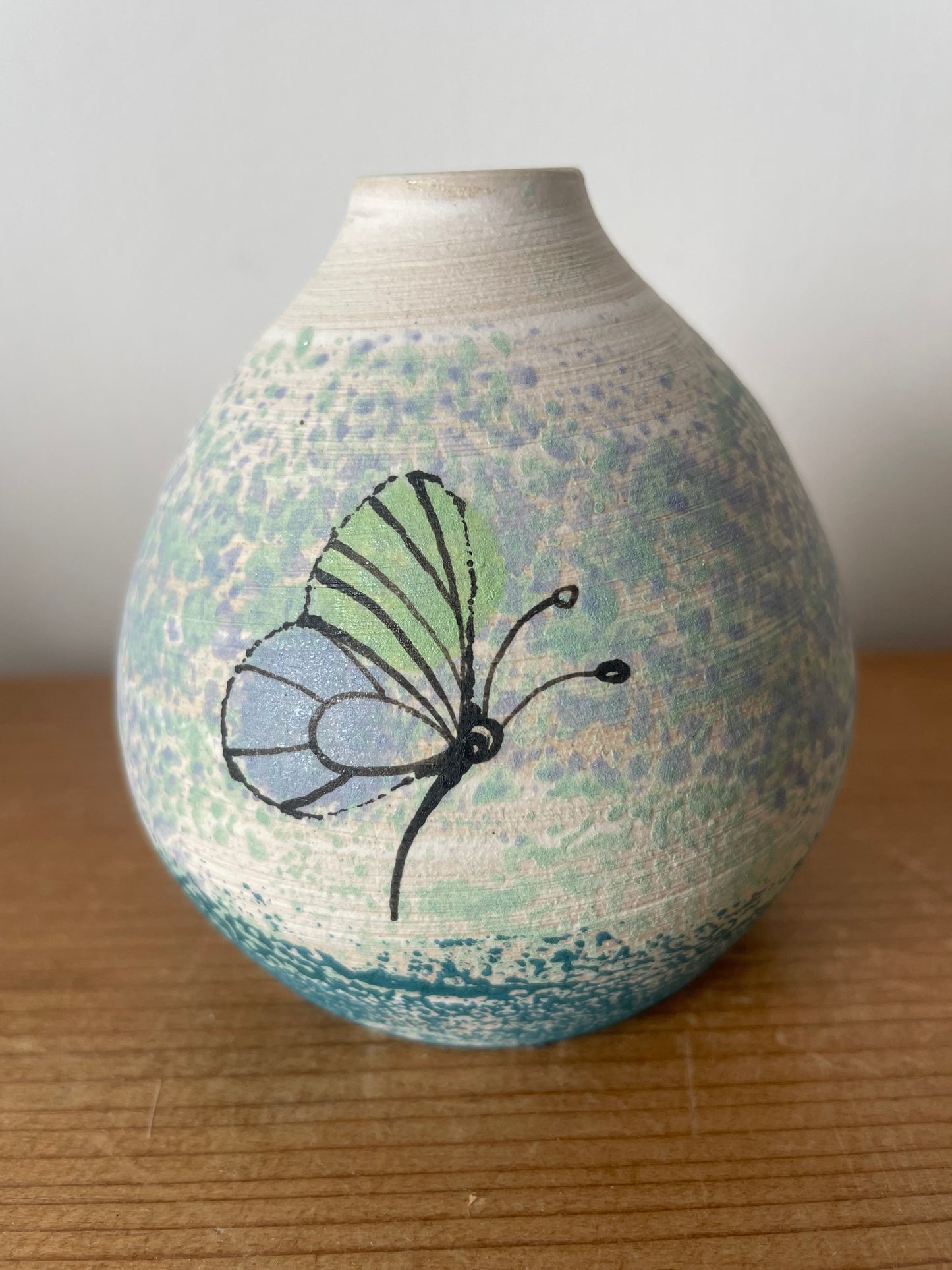Ceramic butterfly diffuser.