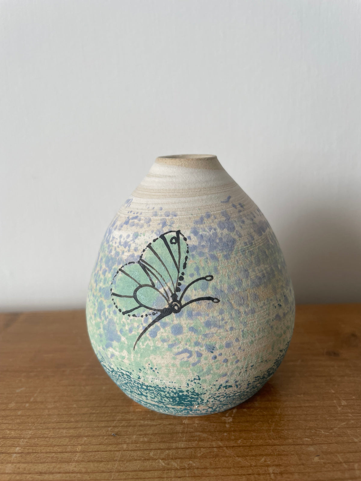 Ceramic butterfly diffuser.