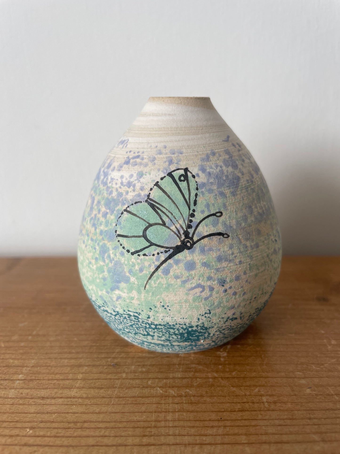 Ceramic butterfly diffuser.
