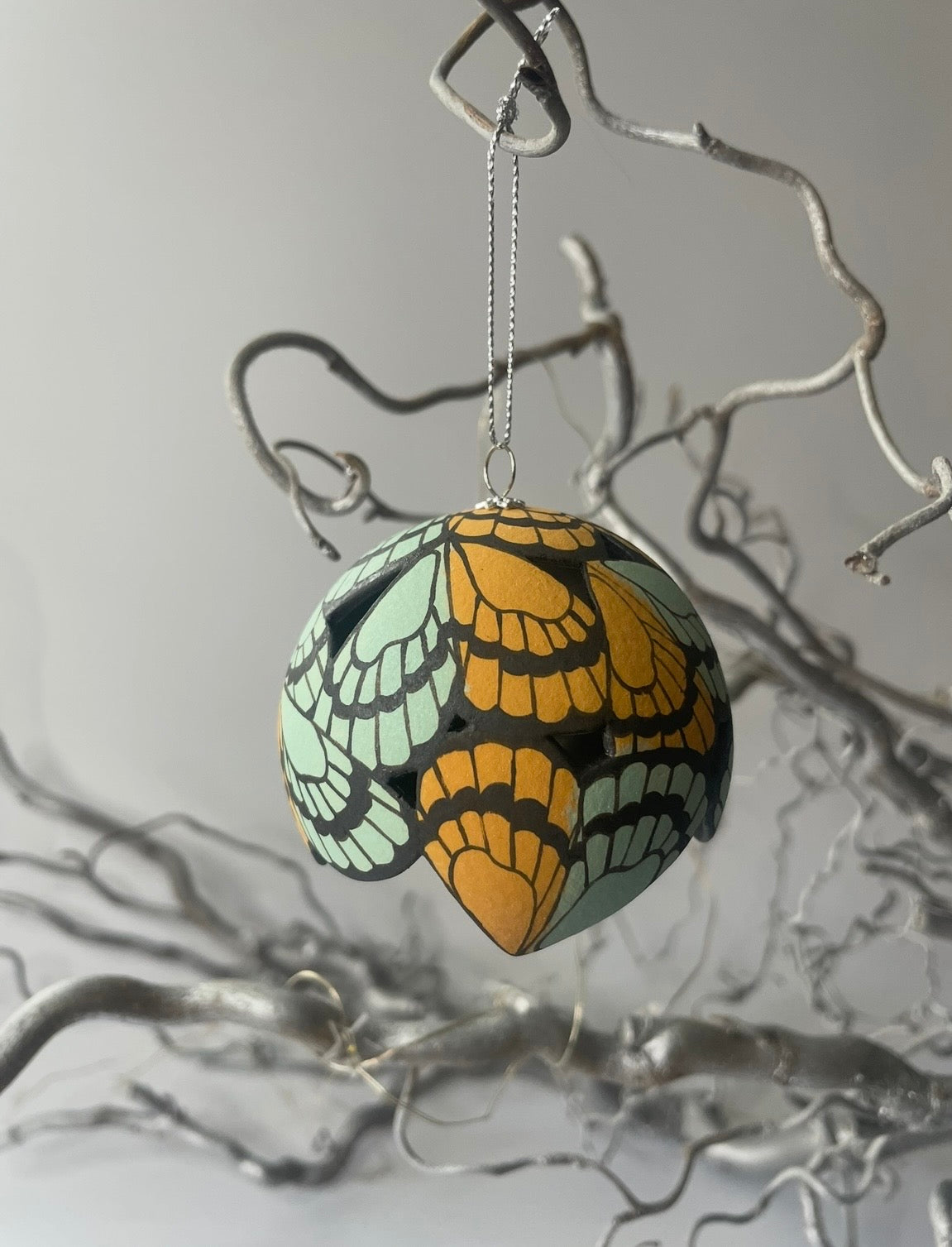 Ceramic butterfly bauble.