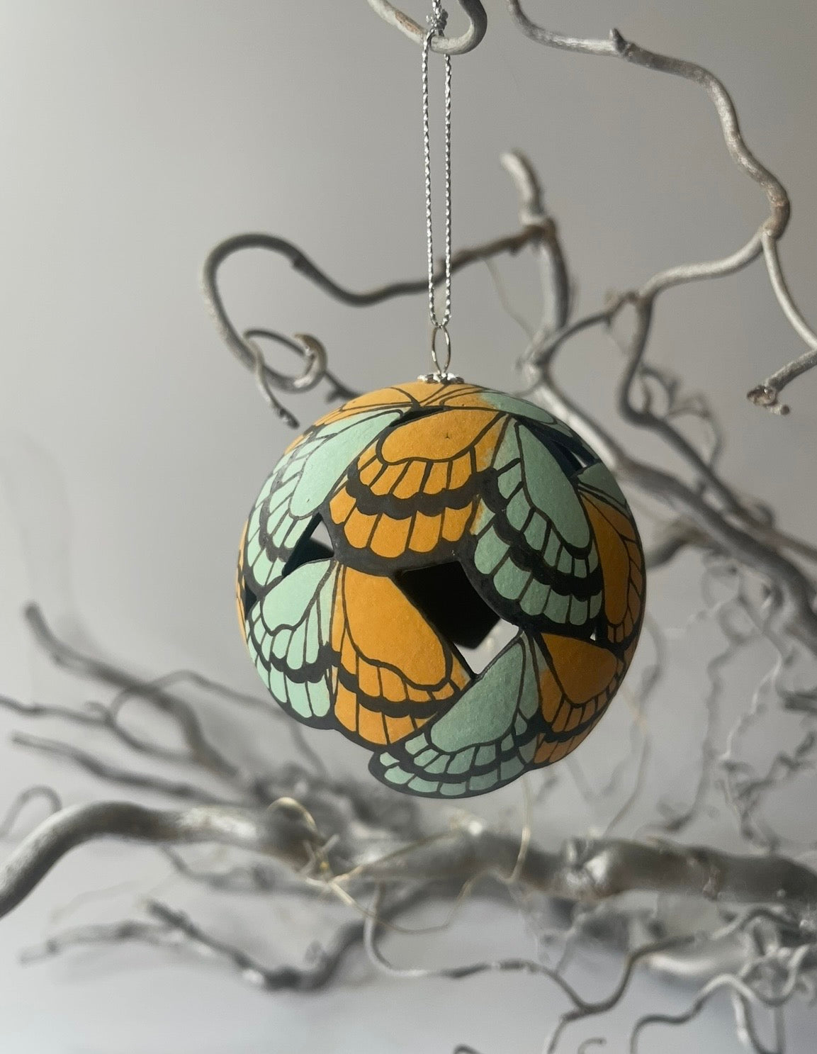 Ceramic butterfly bauble.