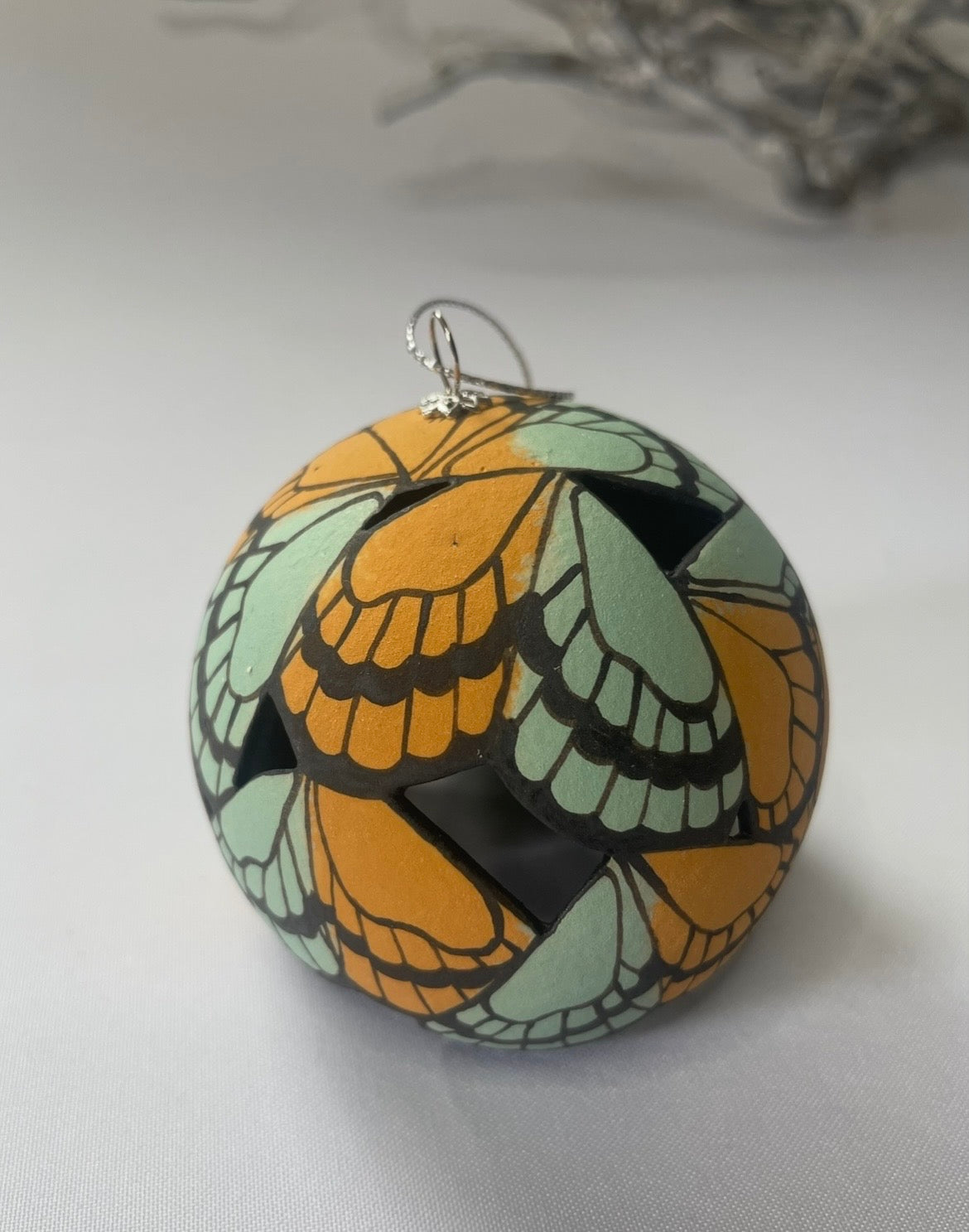 Ceramic butterfly bauble.