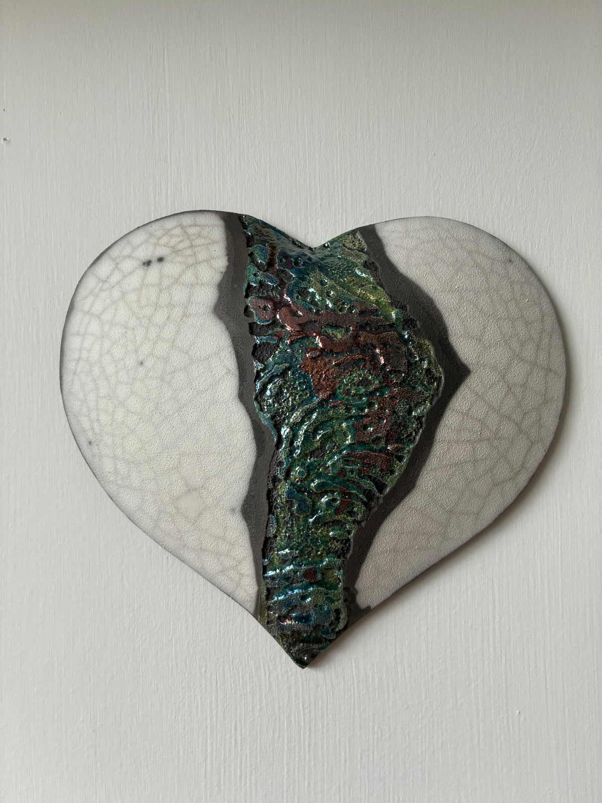 Raku fired wall heart.