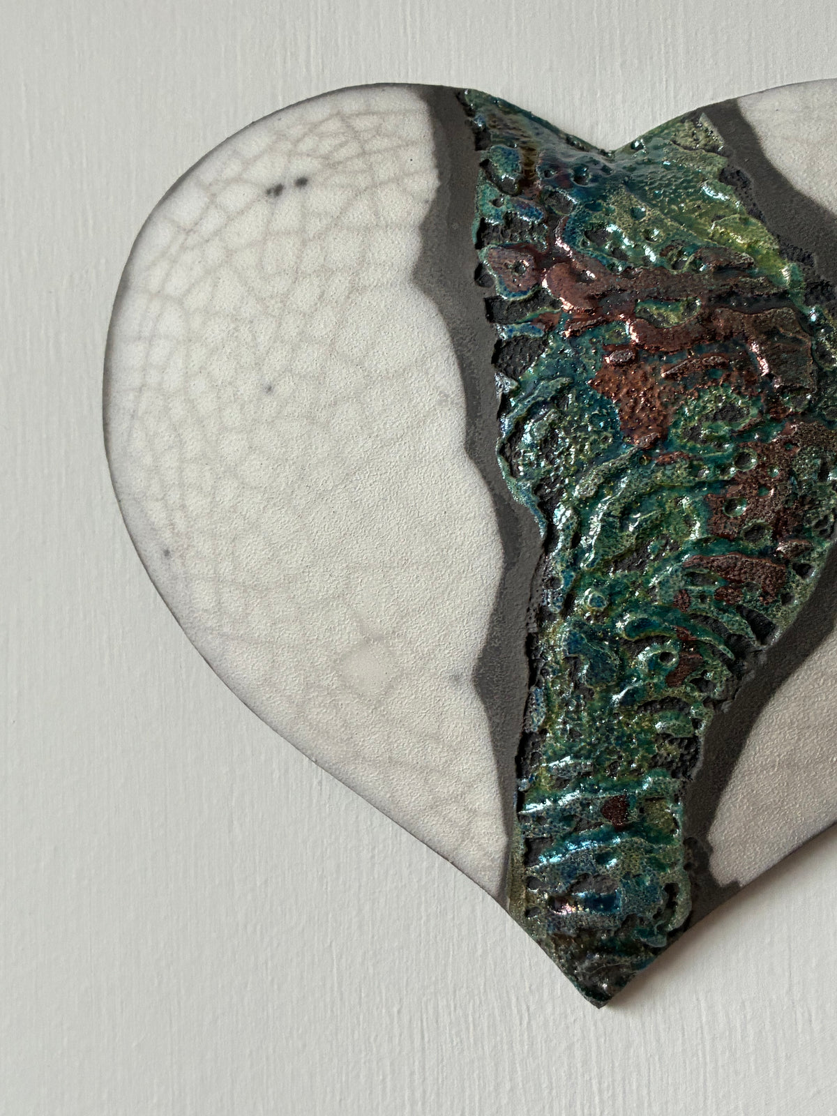 Raku fired wall heart.