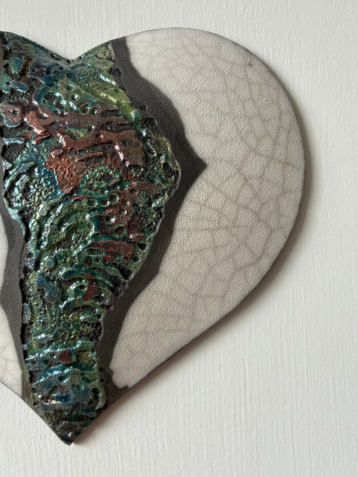 Raku fired wall heart.