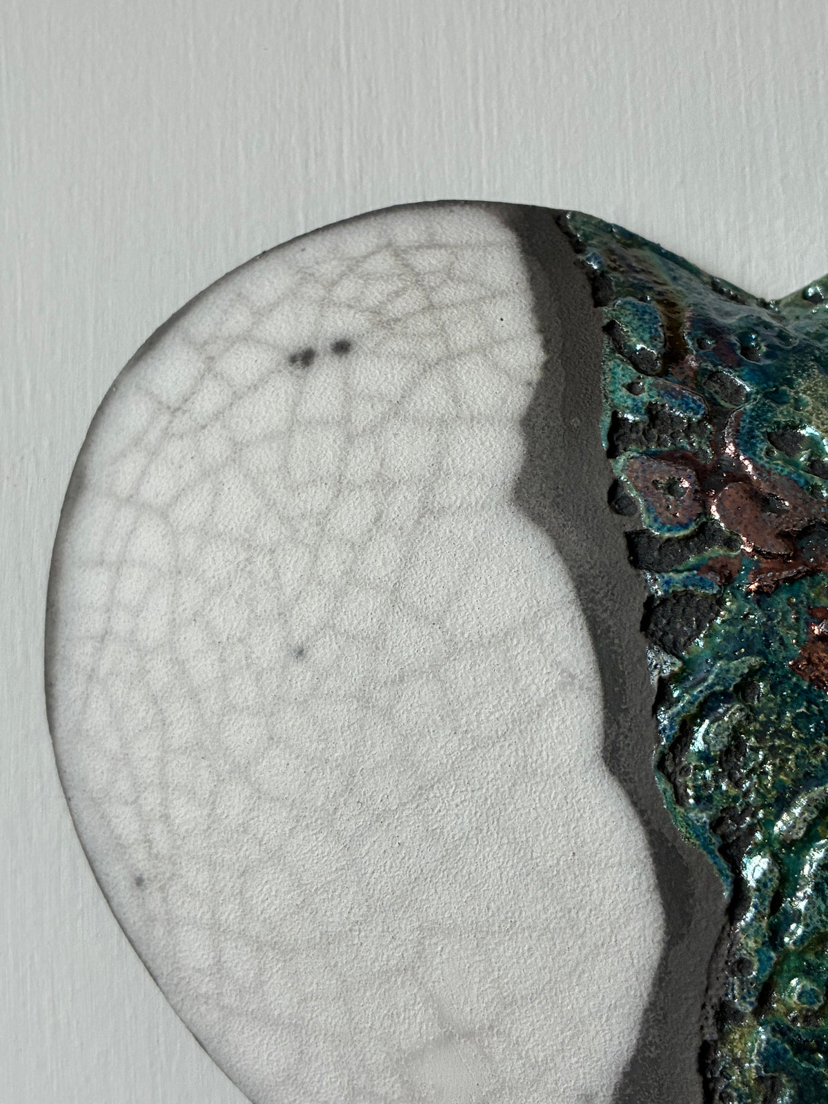 Raku fired wall heart.